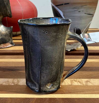 Daniel Bellow: Orange and Black Mug